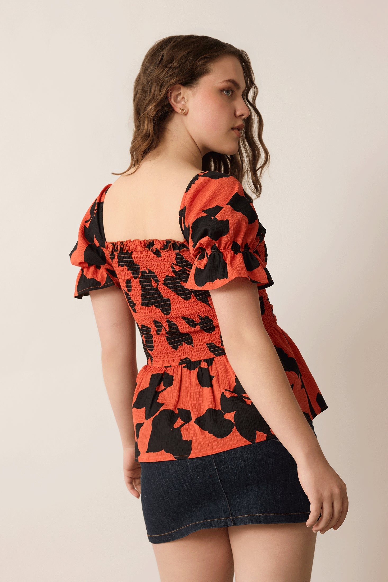 Bailey in Bold Peplum Top In Red