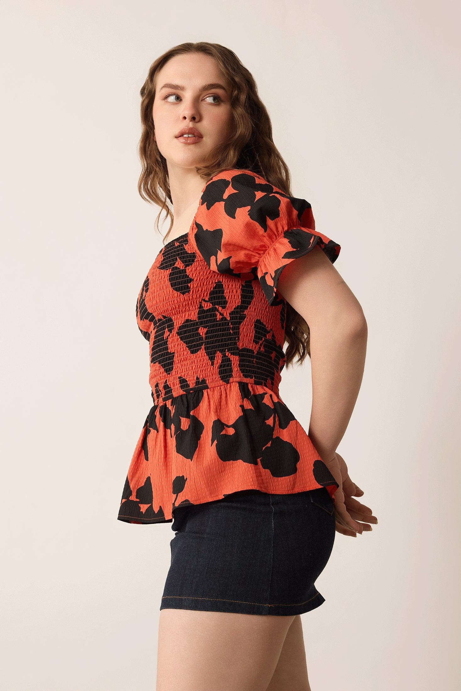 Bailey in Bold Peplum Top In Red