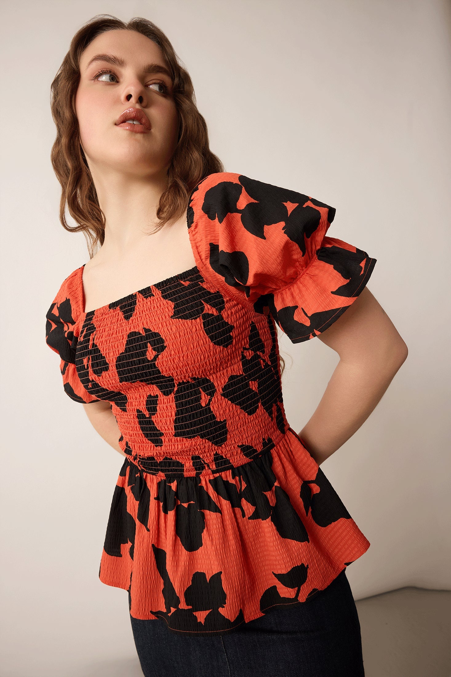 Bailey in Bold Peplum Top In Red