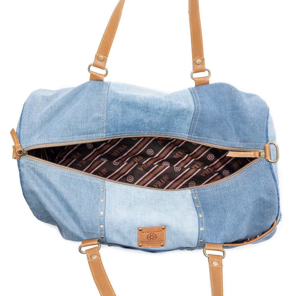 Wildberry Voyager Traveler Bag in Cranberry Denim Blue