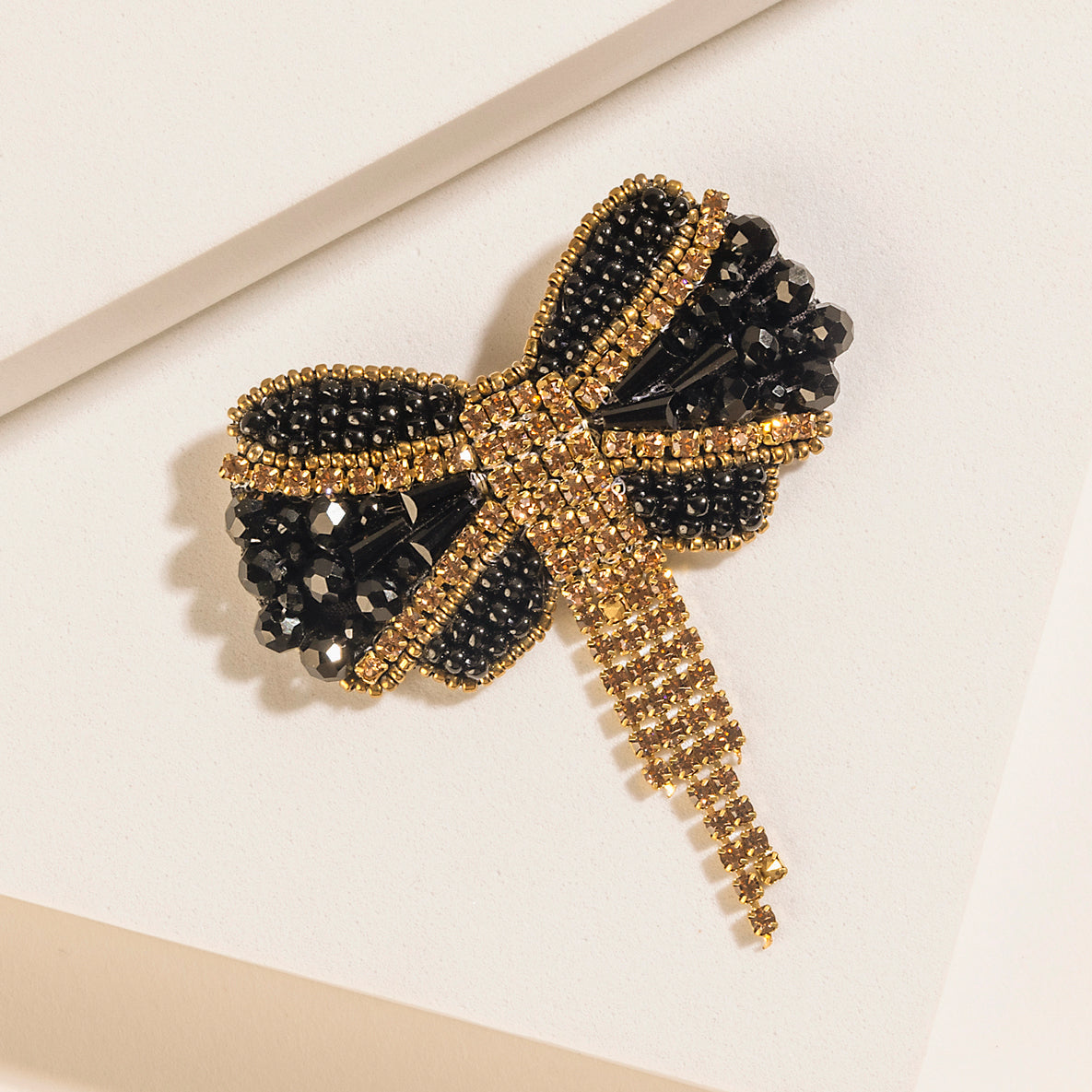 Evening Grace Bow Brooch in Gilded Gold