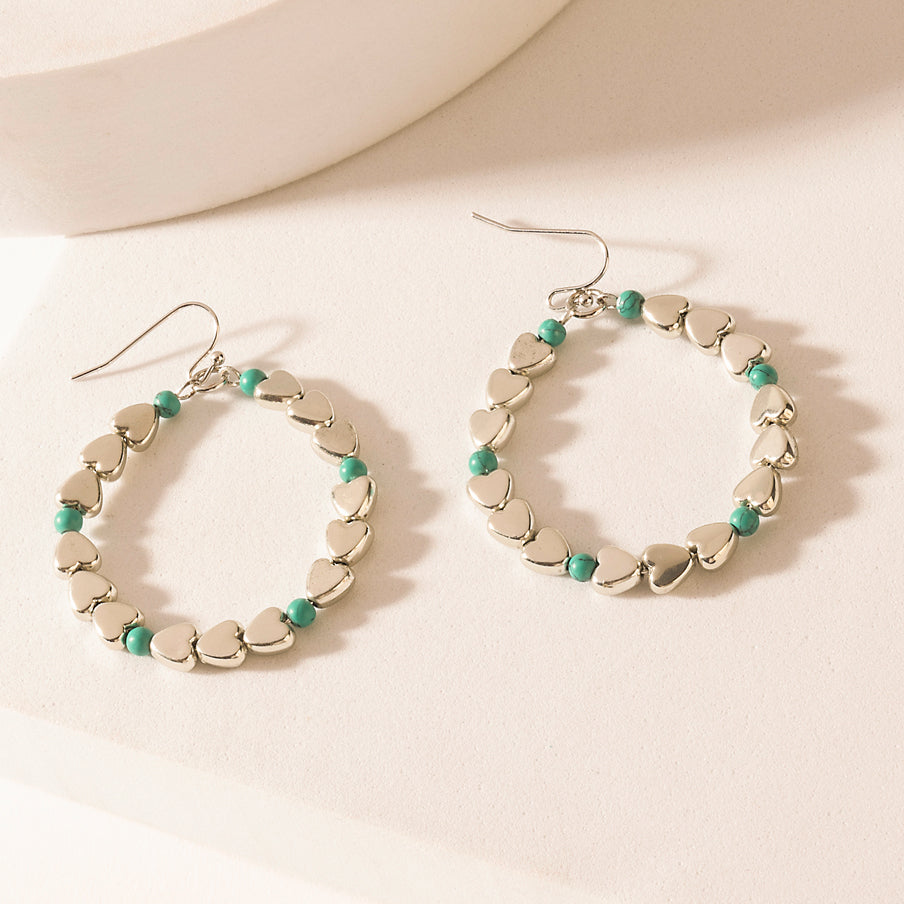 Trail of Hearts Hoop Earrings in Arctic Silver