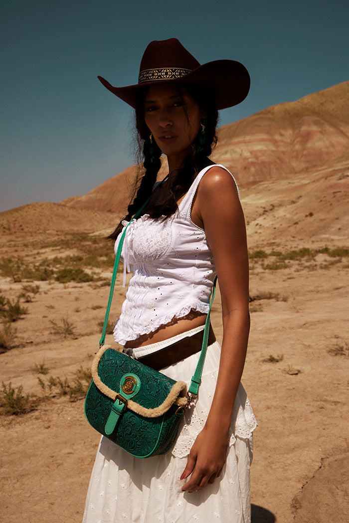 Alpine Rose Embossed Leather Crossbody Bag with Fur Accent Variant Combo