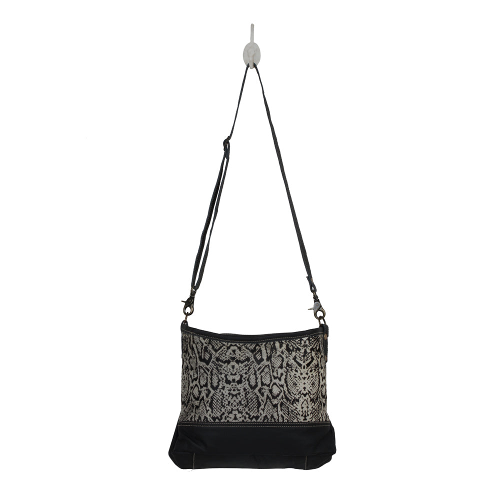 ANTIQUATED  LEATHER AND HAIRON BAG