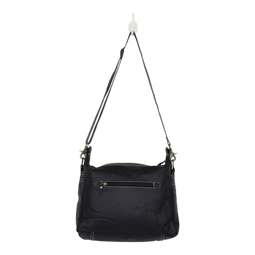 MODERN LEATHER AND HAIRON BAG